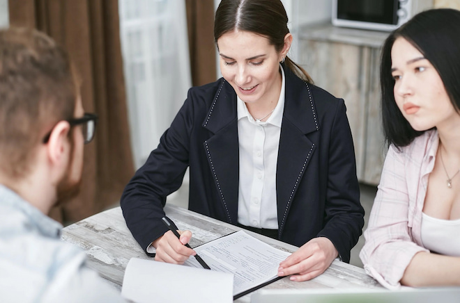 two women speaking tot their insurance broker